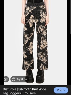 Disturbia Knit Wide-Leg Joggers in Black & Cream Moth Print